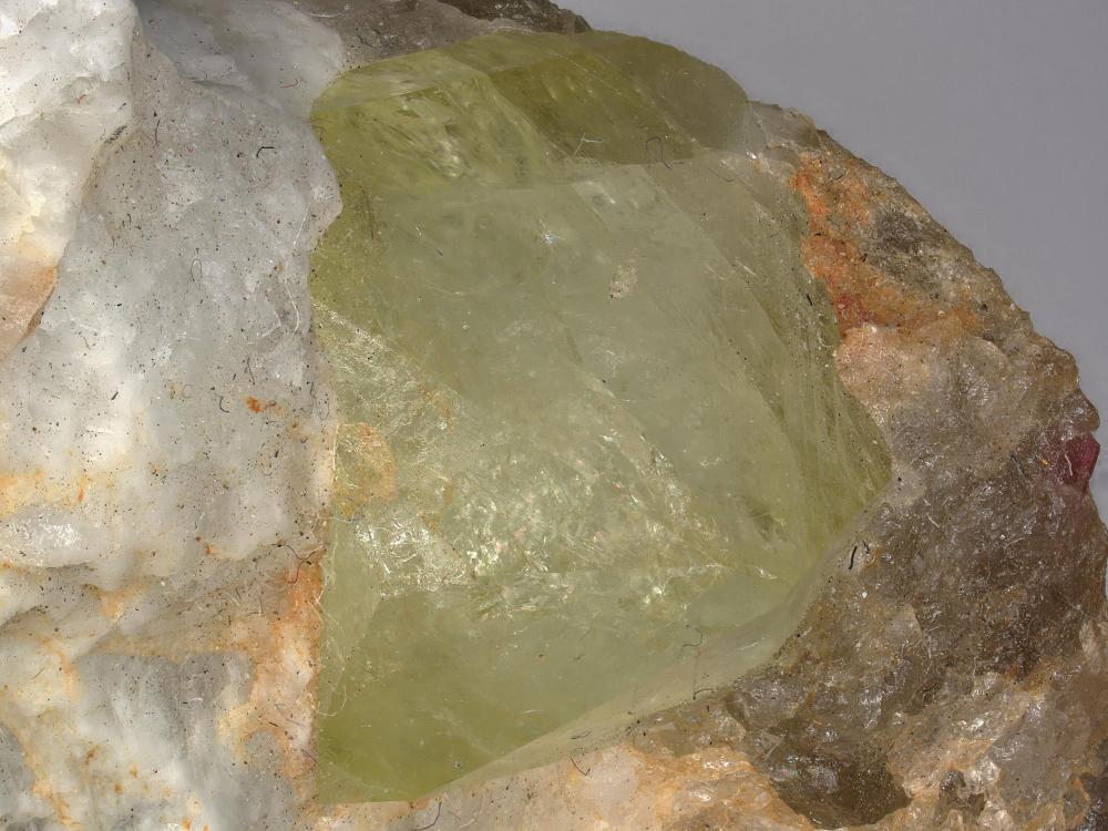 Rhodizite X